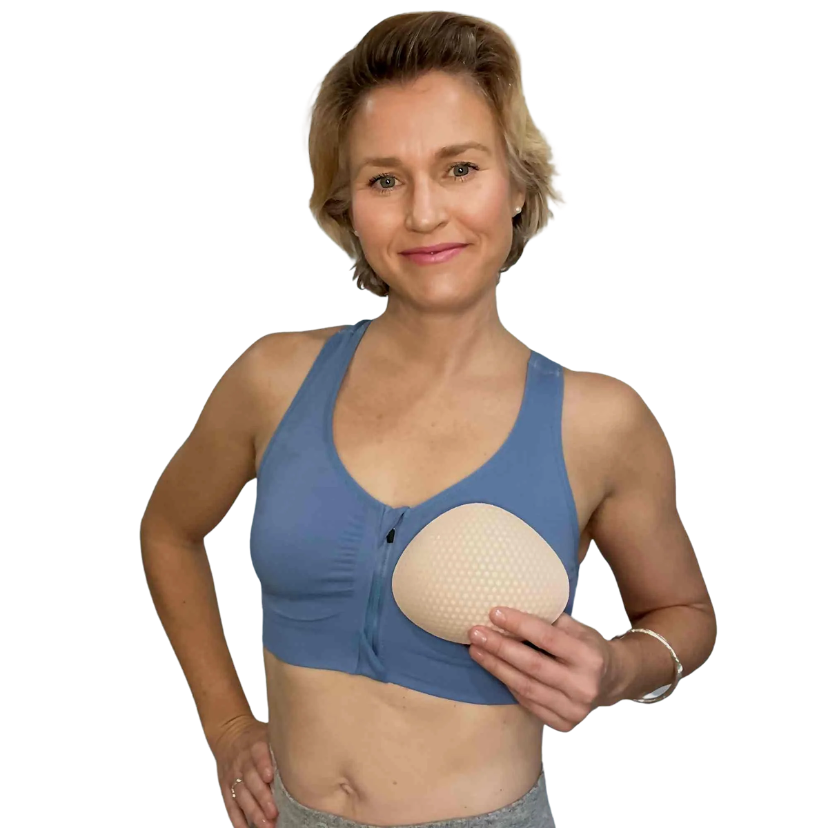 Woman wearing Honeycloudz bra inserts with hybrid grip technology, providing secure, comfortable, and reusable support.